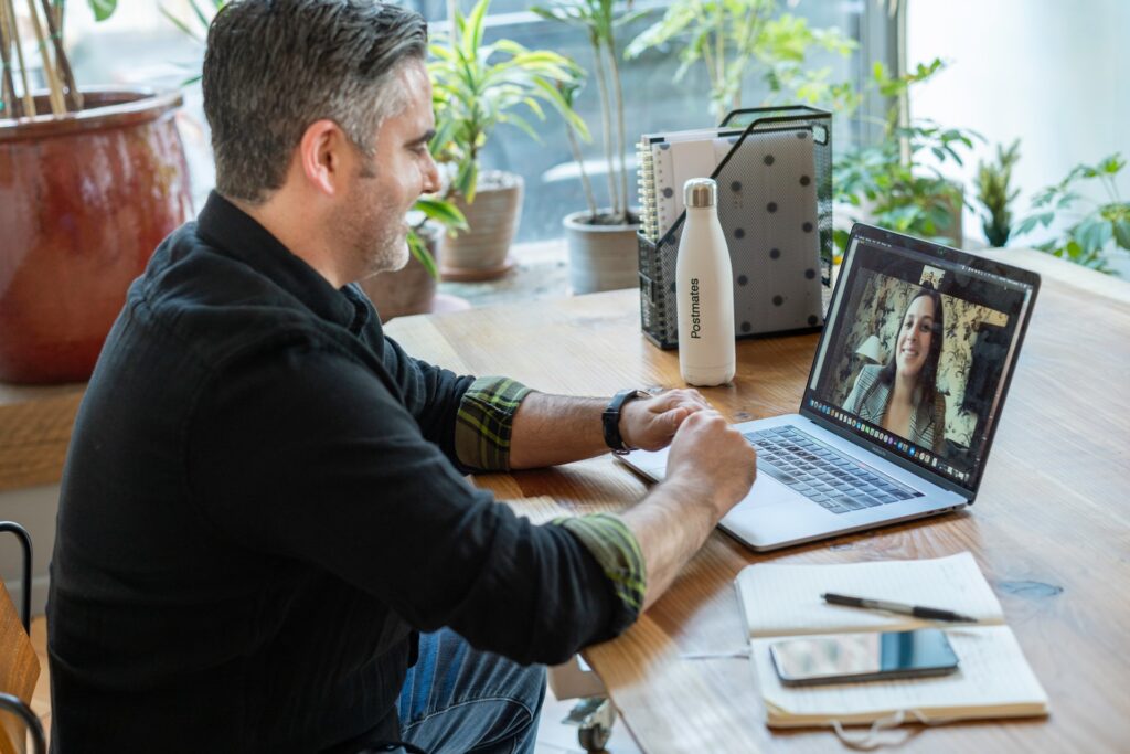 a man at work dealing with virtual workplace conflict in a productive and positive way