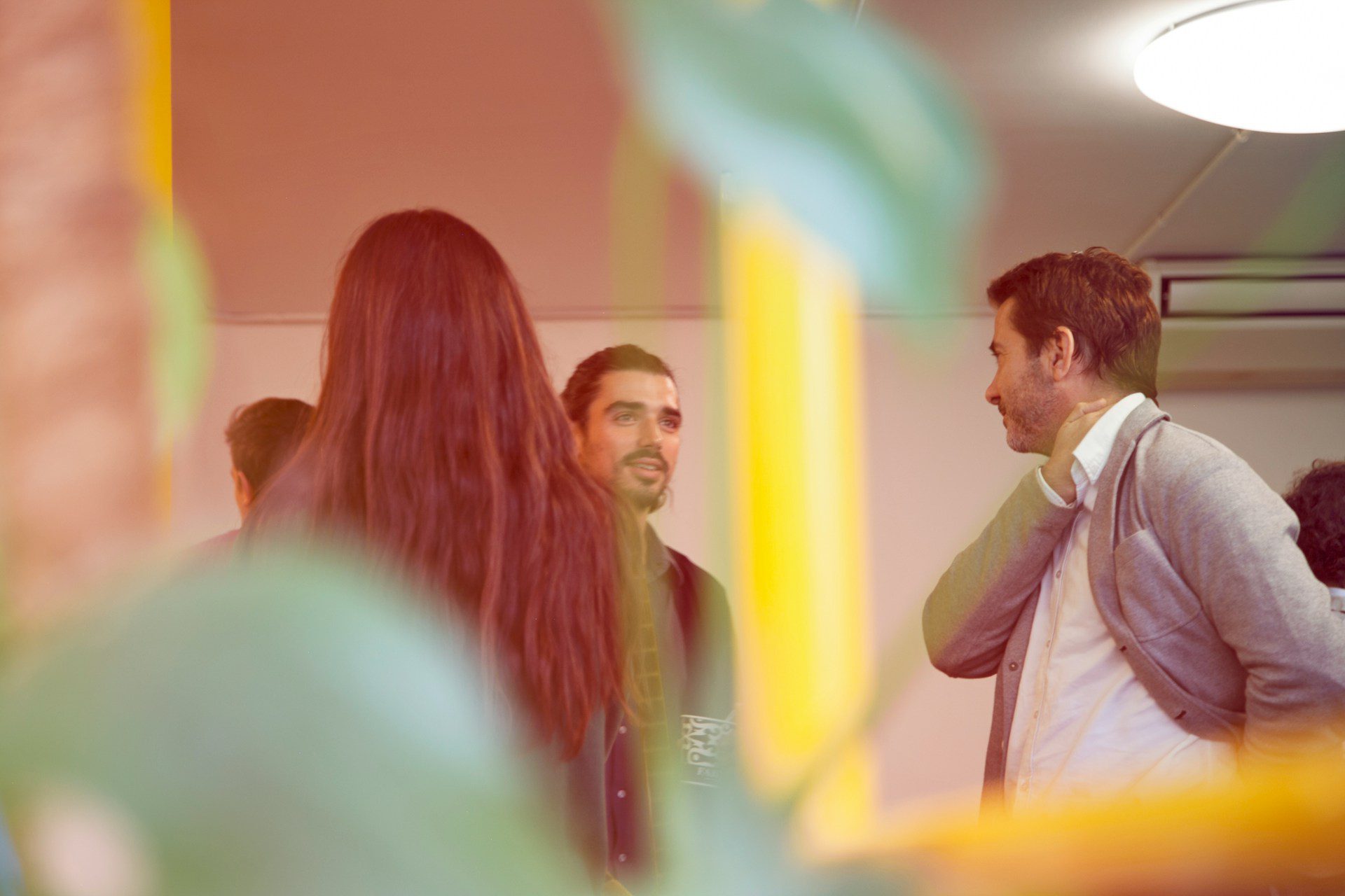 a group of colleagues congregating on a corporate event