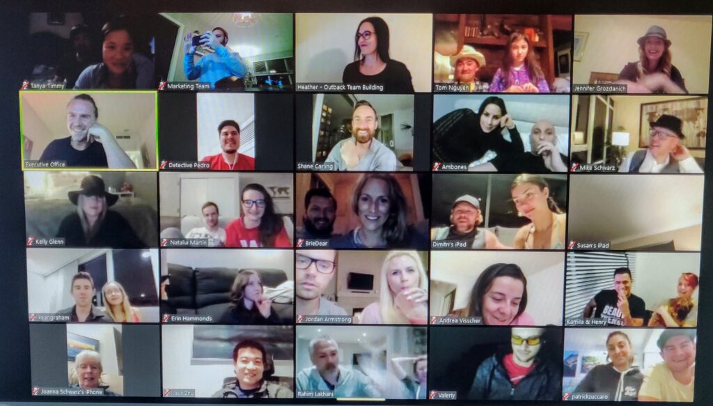 a group of 25 teammates doing a virtual team building activity together on zoom
